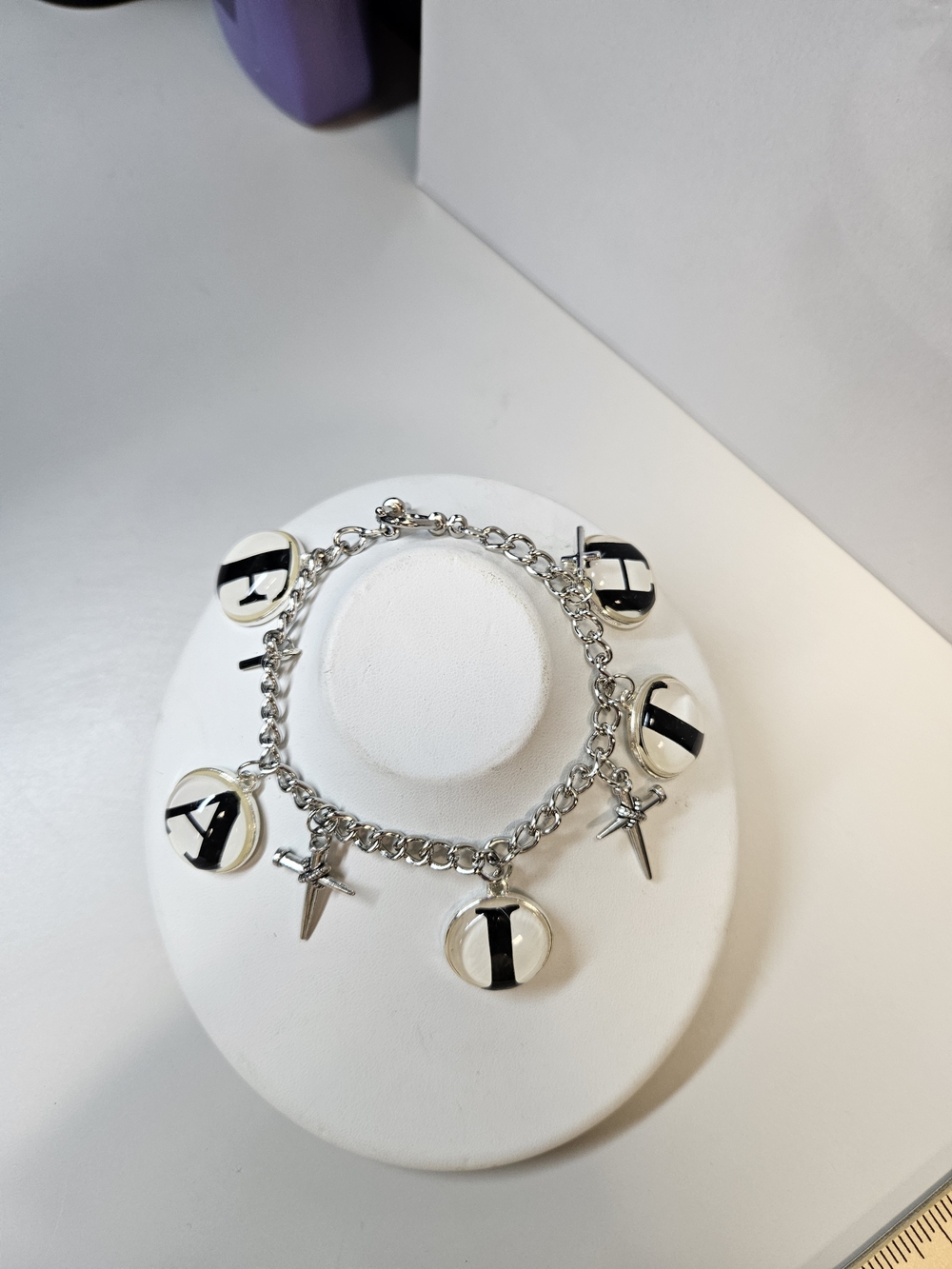 Silver-Tone Charm Bracelet with Black Accent Discs That Spell FAITH